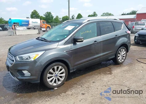 2017 Ford Escape Titanium z USA, uszkodzony, nr VIN 1FMCU0J97HUC12229